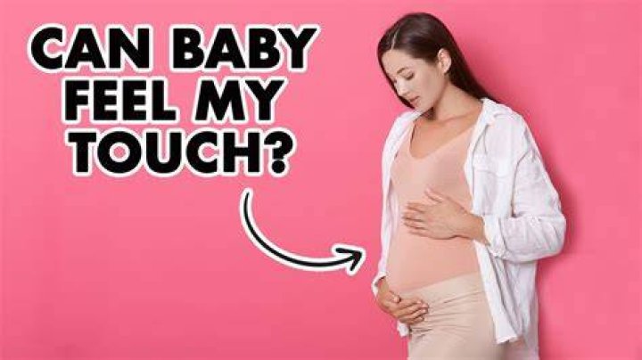 Can baby feel when you touch your belly?