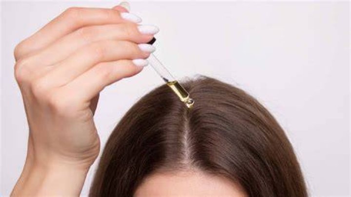 Do I apply castor oil to wet or dry hair?