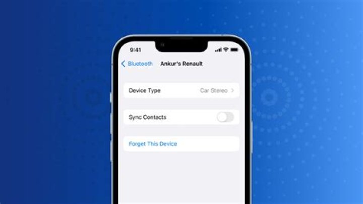 How do I delete a paired Bluetooth device from my iPhone?