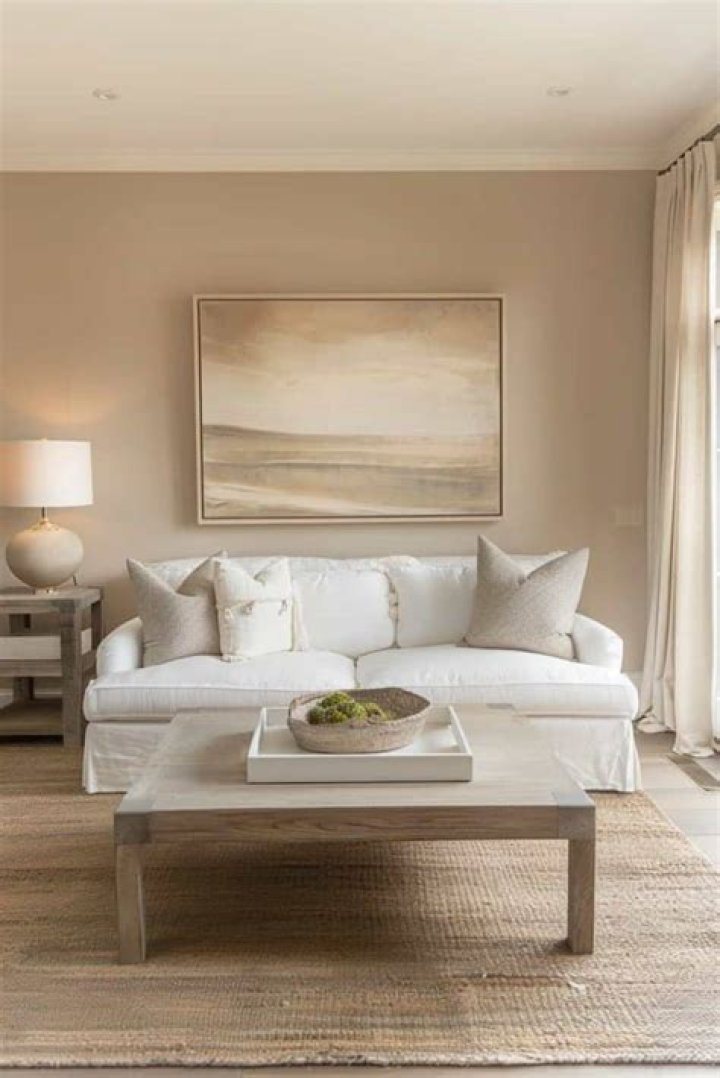How do you brighten a beige living room?