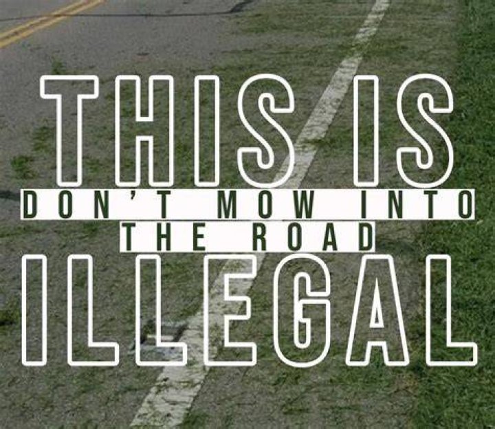 Is it illegal to mow grass into the road in Alabama?